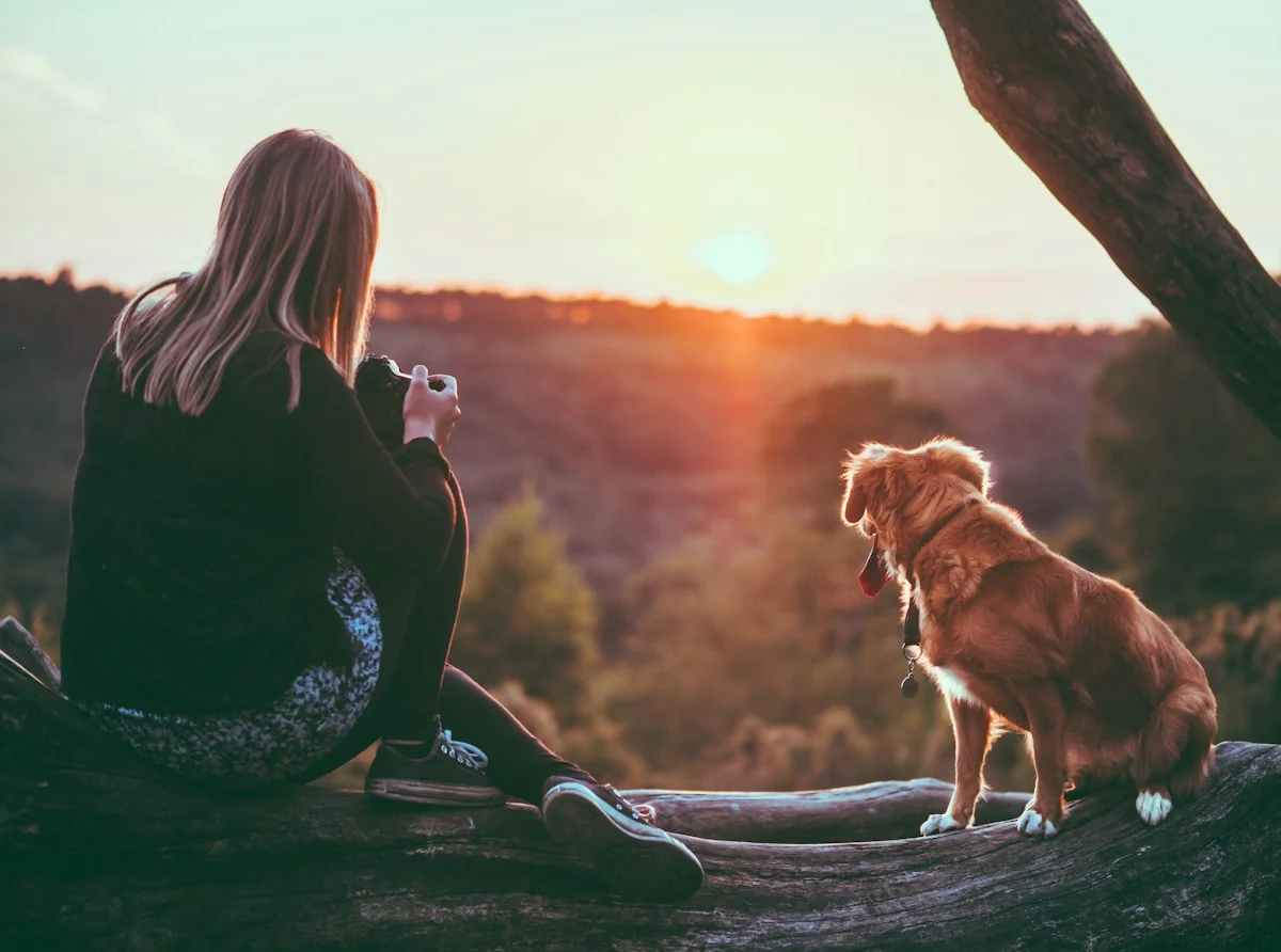 A loving moment between a woman and her dog